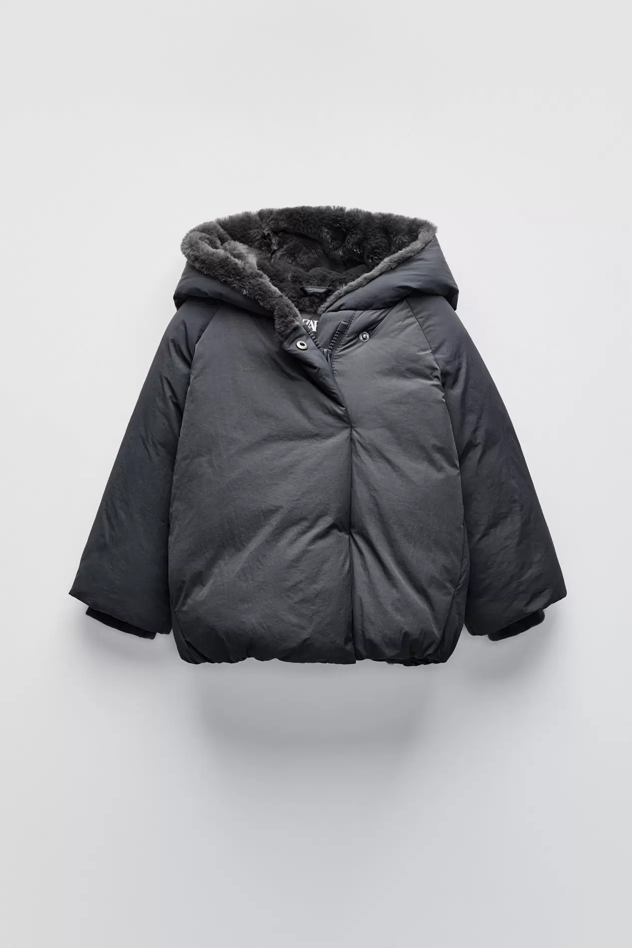 MANTEAU DOUBLÉ À CAPUCHE offre à 35,95€ sur Zara