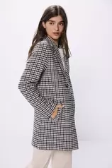 Manteau trapèze à carreaux offre à 54,99€ sur Springfield