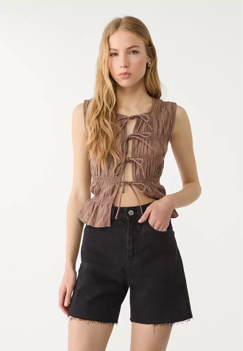 D93 Short denim longline offre à 25,99€ sur Stradivarius