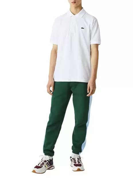 Polo L1212 en coton blanc uni coupe droite... offre à 110€ sur CCV
