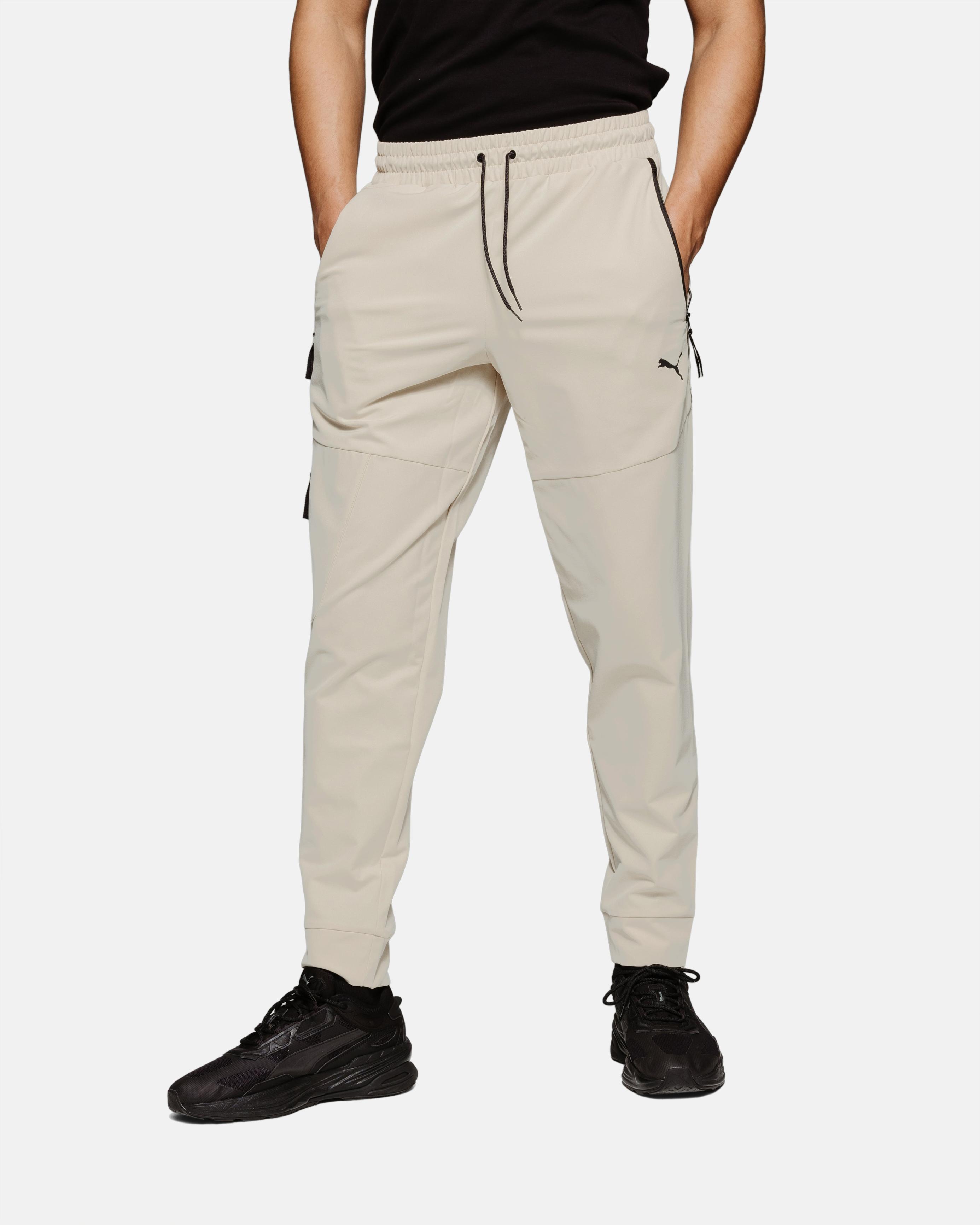 Pantalon Puma Tech - Beige                                        3               couleurs offre à 41,94€ sur Footkorner