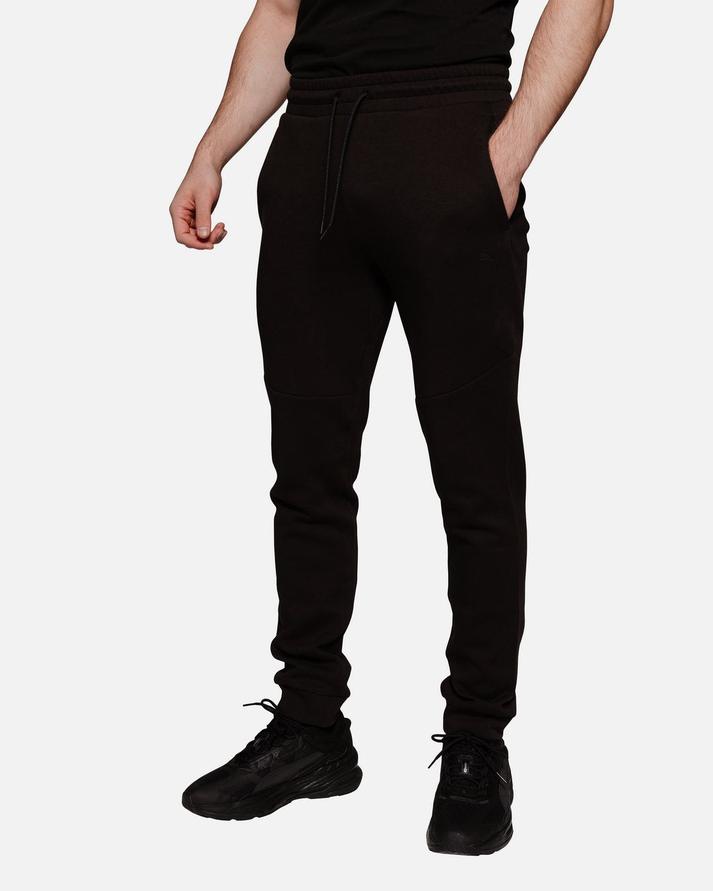 Pantalon Puma PumaTech -  Noir                                        2               couleurs offre à 38,94€ sur Footkorner