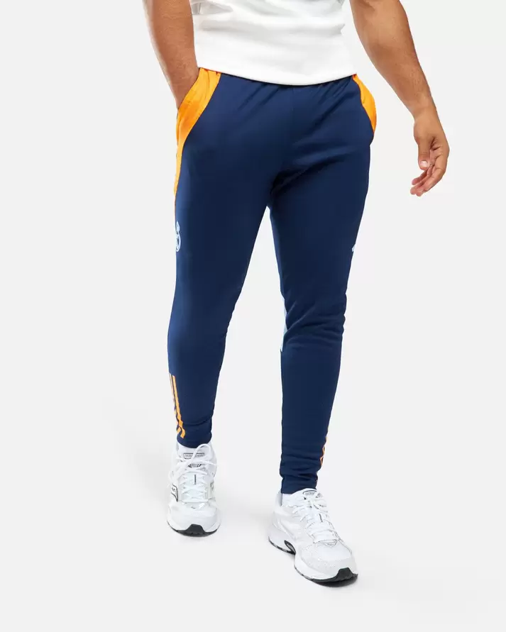 Pantalon d'entrainement Real Madrid 2024/2025 - Bleu/Orange   1 couleur offre à 51,92€ sur Footkorner