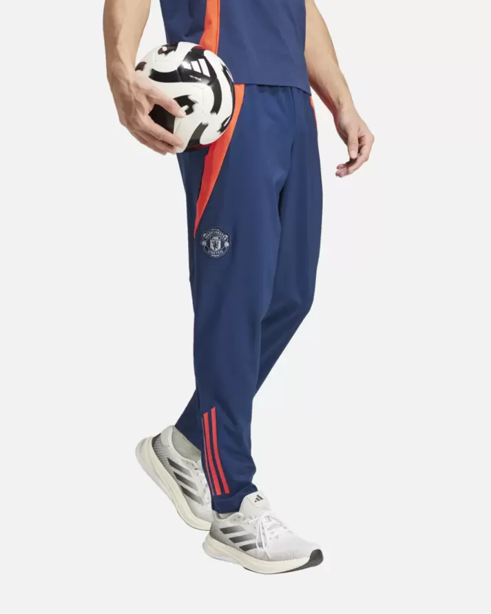 Pantalon de survêtement Manchester United 2024/2025 - Bleu/Orange   1 couleur offre à 45,43€ sur Footkorner