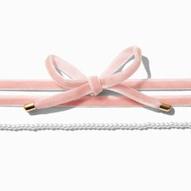 Collier et ras-de-cou perles d'imitation et nœud rose - Lot de 2 offre à 7€ sur Claire's