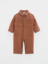 Long jumpsuit in rust-coloured twill offre à 75€ sur Natalys