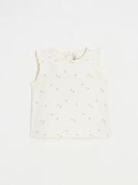 Sleeveless t-shirt with flower pattern offre à 17,5€ sur Natalys