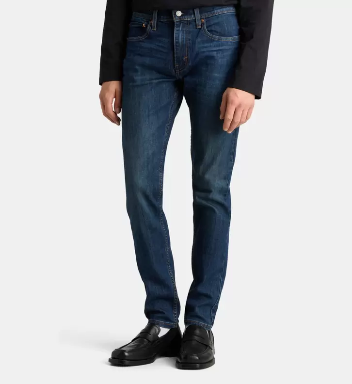 Jean 512 slim tapered délavé offre à 59,4€ sur Galeries Lafayette