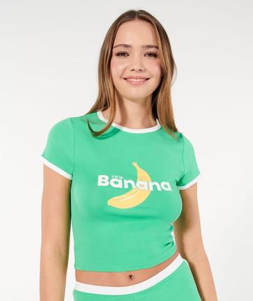 Shoppez notre top JUTIZ. Ce haut vert arborant le message "banana", en hommage au fruit unanimement              ...                             Voir plus