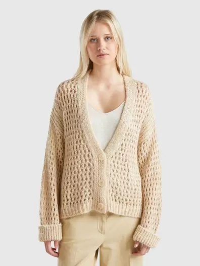 Gilet avec tulle et lurex offre à 99,95€ sur United Colors Of Benetton