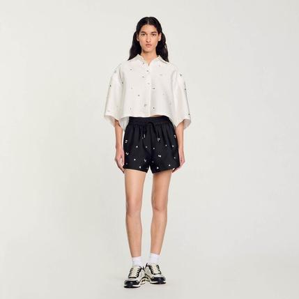 Short large strassé offre à 195€ sur Sandro