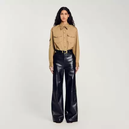 Pantalon évasé en cuir offre à 525€ sur Sandro