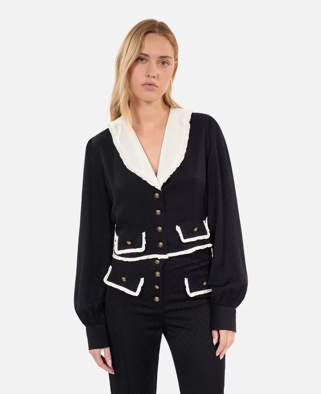 Top à volants noir offre à 117€ sur The Kooples