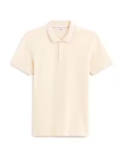 Polo piqué slim en coton stretch - écru offre à 22,99€ sur Celio